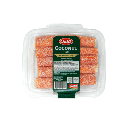 Galil Coconut Bar in a clear plastic container with red coconut sticks and green product label on top.
